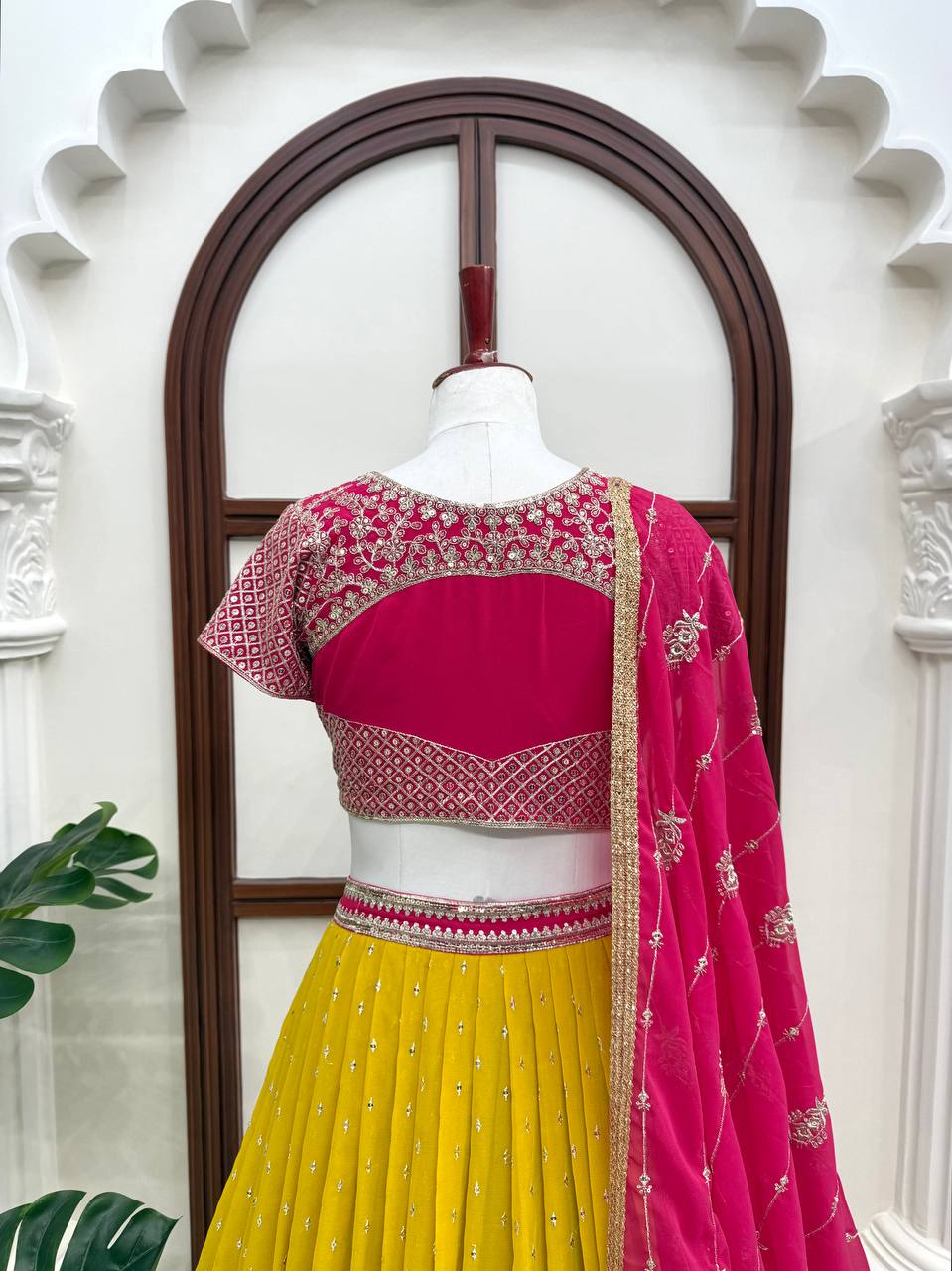 Vibrant Sunshine Yellow and Fuchsia Pink Designer Lehenga Choli with Dazzling Shimmer Embellishments